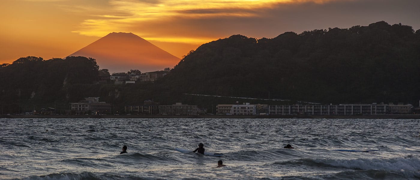 Kamakura sunset over ocean with temples
